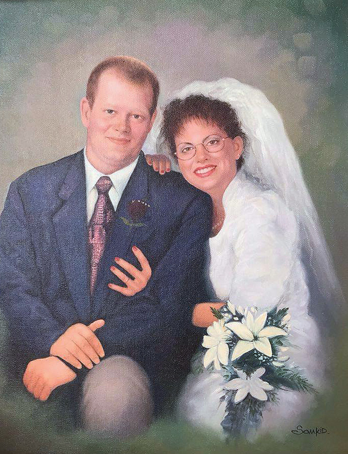 En oljemålning av en brudgum och hans brud