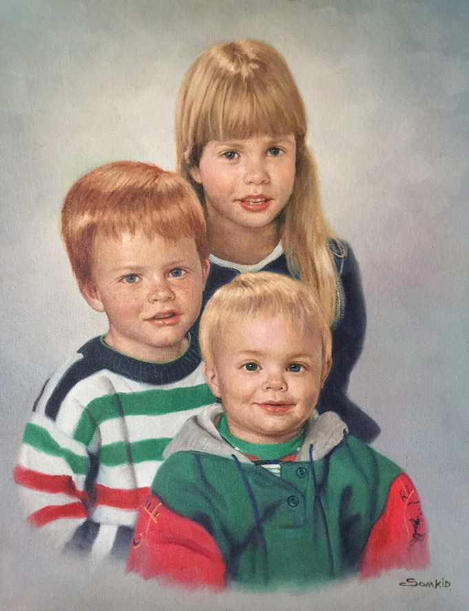 Porträtt av tre barn